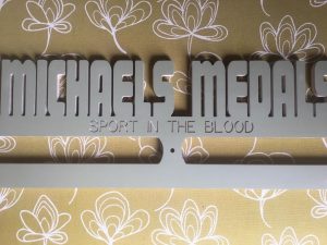 basketball and football medal holder